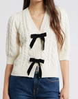CLARISSA BOW SWEATER